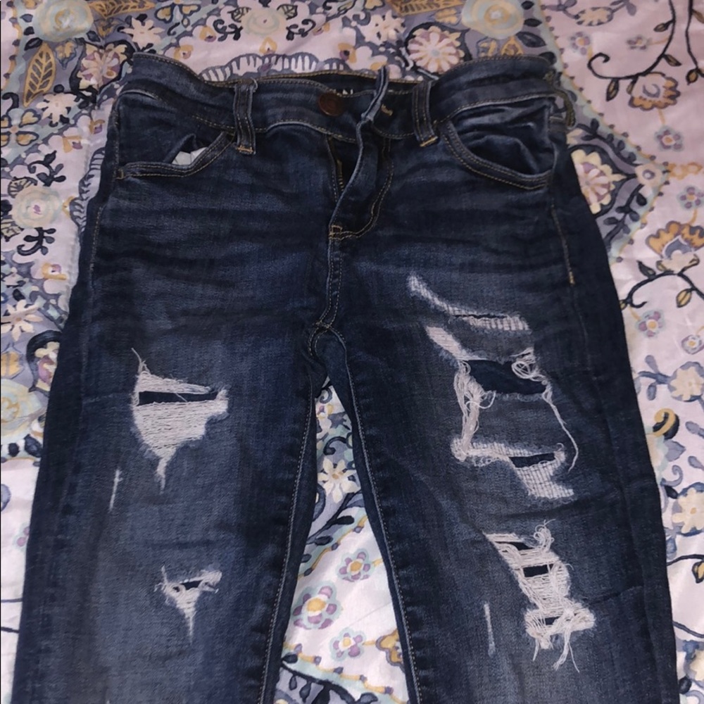 American eagle dark washed jeans.